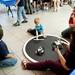 Ann Arbor resident Daniel Pritts, 4, and his father, Dan, inspects controlled robots during the Mini Maker Faire on Saturday, June 8. Daniel Brenner I AnnArbor.com